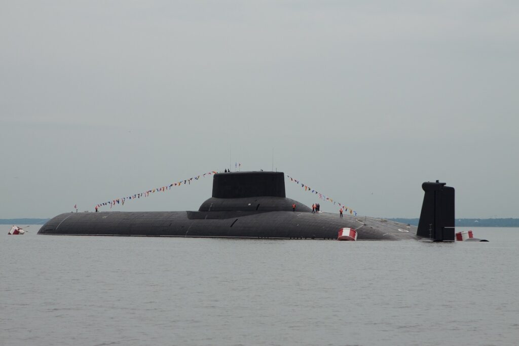An Akula Class Submarine, NATO Code name: Typhoon rests on a calm sea. 